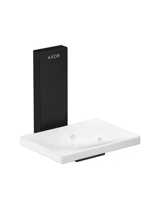 Schwarze Wandhalterung mit einer rechteckigen weißen Seifenschale von AXOR, ausgestattet mit drei kleinen Halterungen auf der Oberfläche.